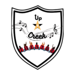 Shield-shaped Up A Creek Theatre logo: "Up A Creek" over a gold star, with musical notes and a treble clef sweeping across the middle, and "THEATRE" in red block letters above silhouettes of people with raised arms.