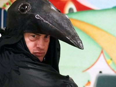 Actor in Raven costume
